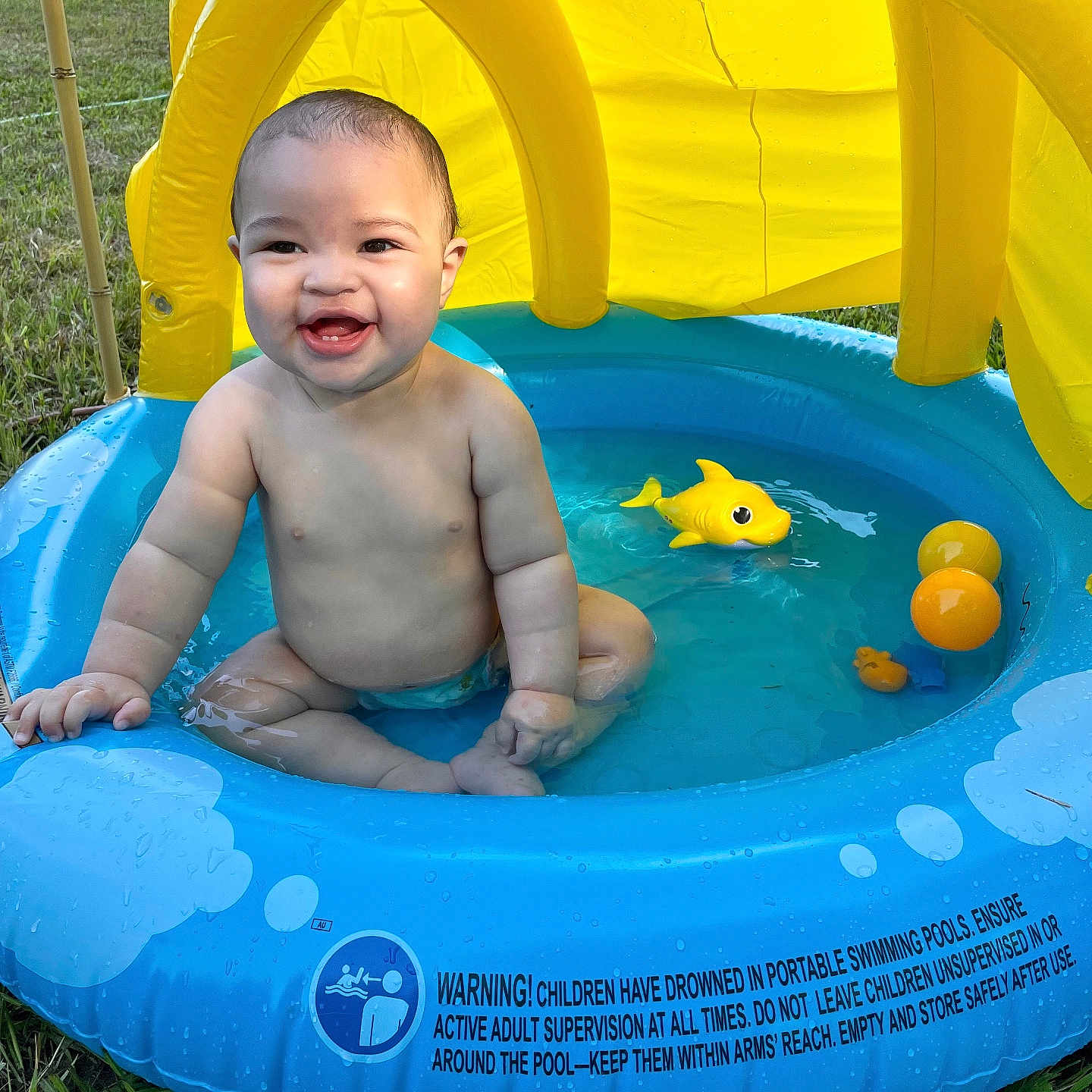 Waylon joined the competition — help win amazing prizes! baby, backyard, face, grass, happy, head, leisureactivities, nature, outdoors, person, photography, plant, pool, portrait, sport, summer, swimming, water, watersports, yard