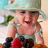 baby, child, hat, green, food, fruit, berry, raspberry, blackberry, blueberry, tart, dessert, smile, happy, cute, closeup, indoor, face, appetite, delicious