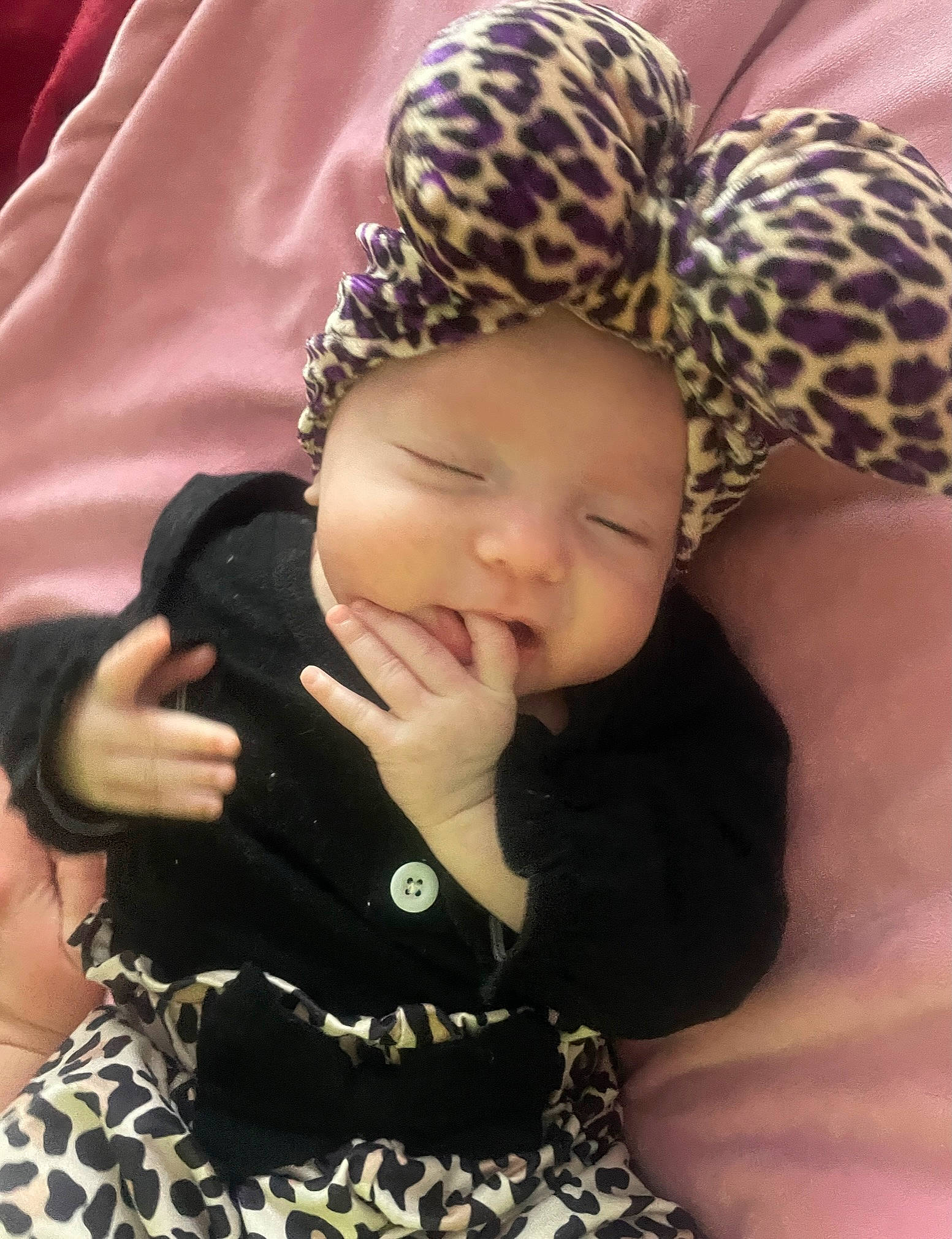 Kaley joined the competition — help win amazing prizes! arm, baby, baby_toddler_clothing, cap, cheek, child, comfort, fashion_accessory, finger, gesture, grass, hand, happy, headwear, pattern, person, sitting, skin, sleeve, thumb