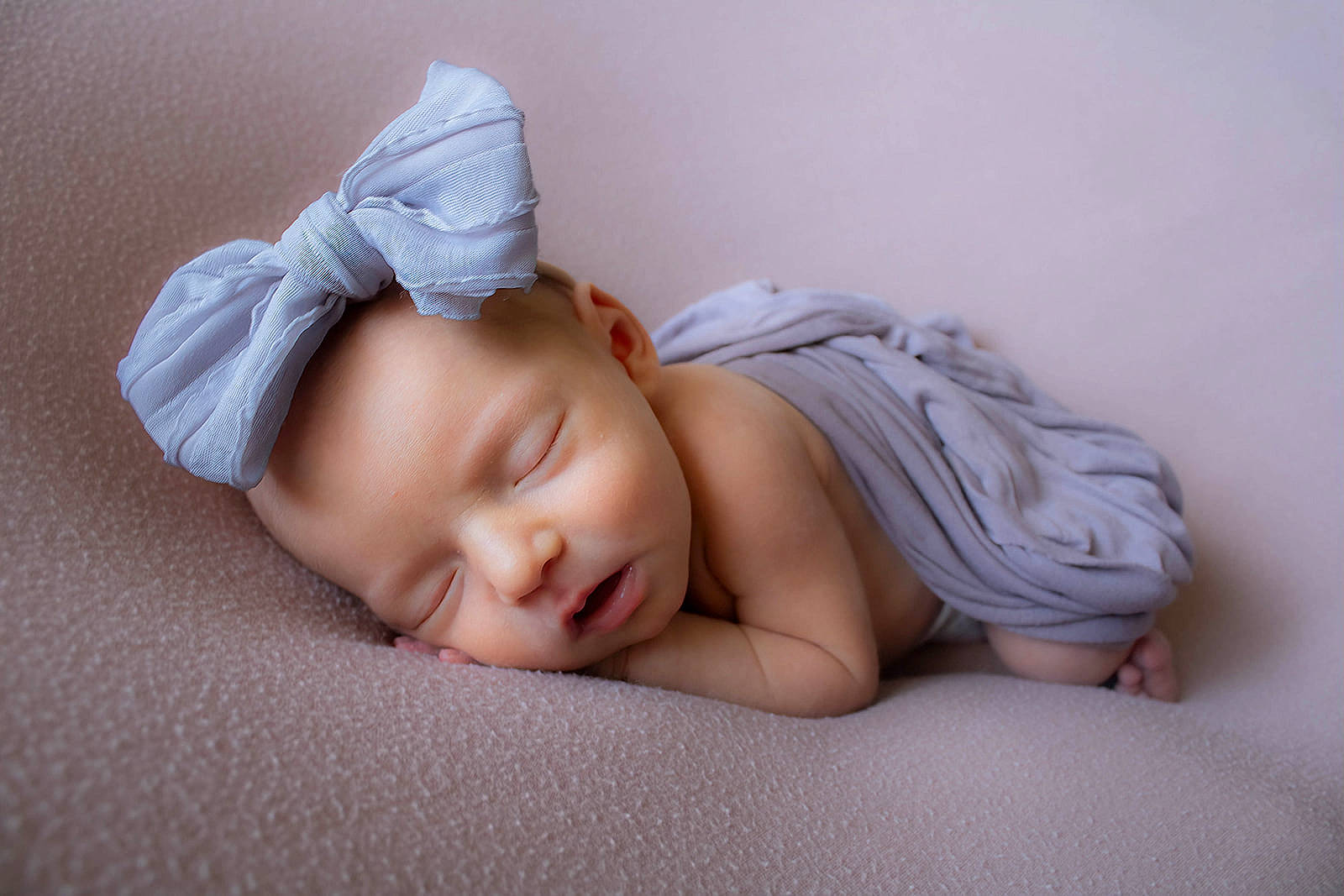 Kaley is registered to the contest to win money with this photo: baby, bedding, bedtime, child, comfort, eye, flash_photography, fur, hand, headgear, linens, lip, nap, person, portrait_photography, room, sitting, skin, sleep, sleeve