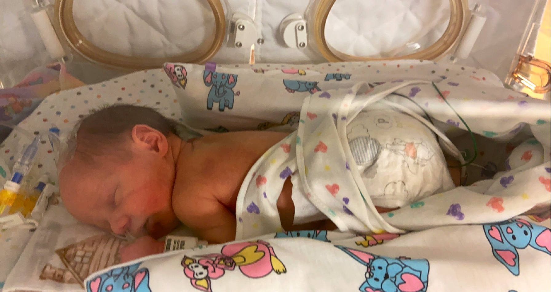 Ian is registered to the contest to win money with this photo: baby, bedtime, birth, child, childbirth, person, product, sleep