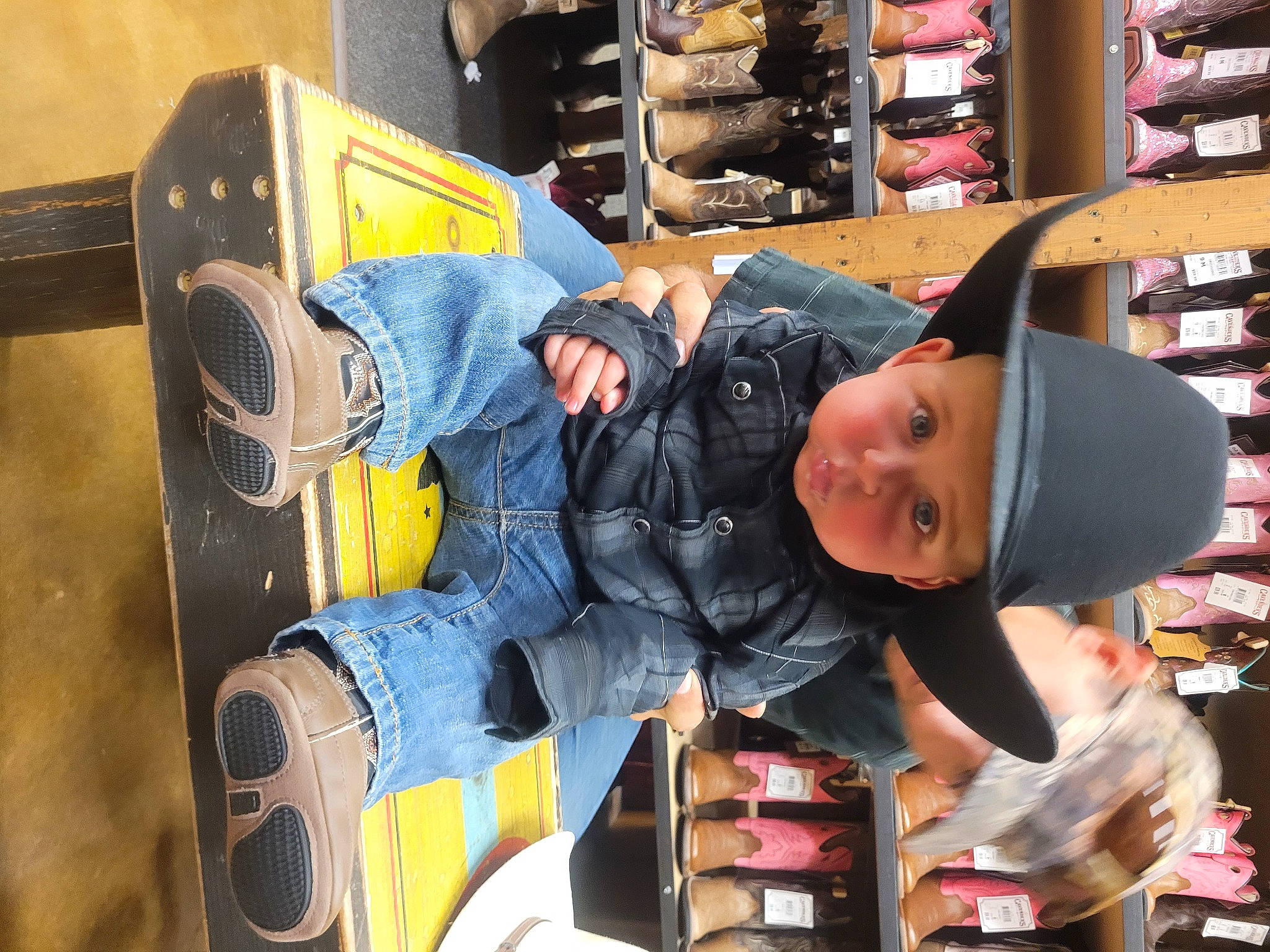 Milan joined the competition — help win amazing prizes! baby, baby_toddler_clothing, child, customer, electric_blue, engineering, fashion_accessory, fun, hat, headgear, headwear, machine, person, personal_protective_equipment, retail, room, shelf, smile, sun_hat, toddler