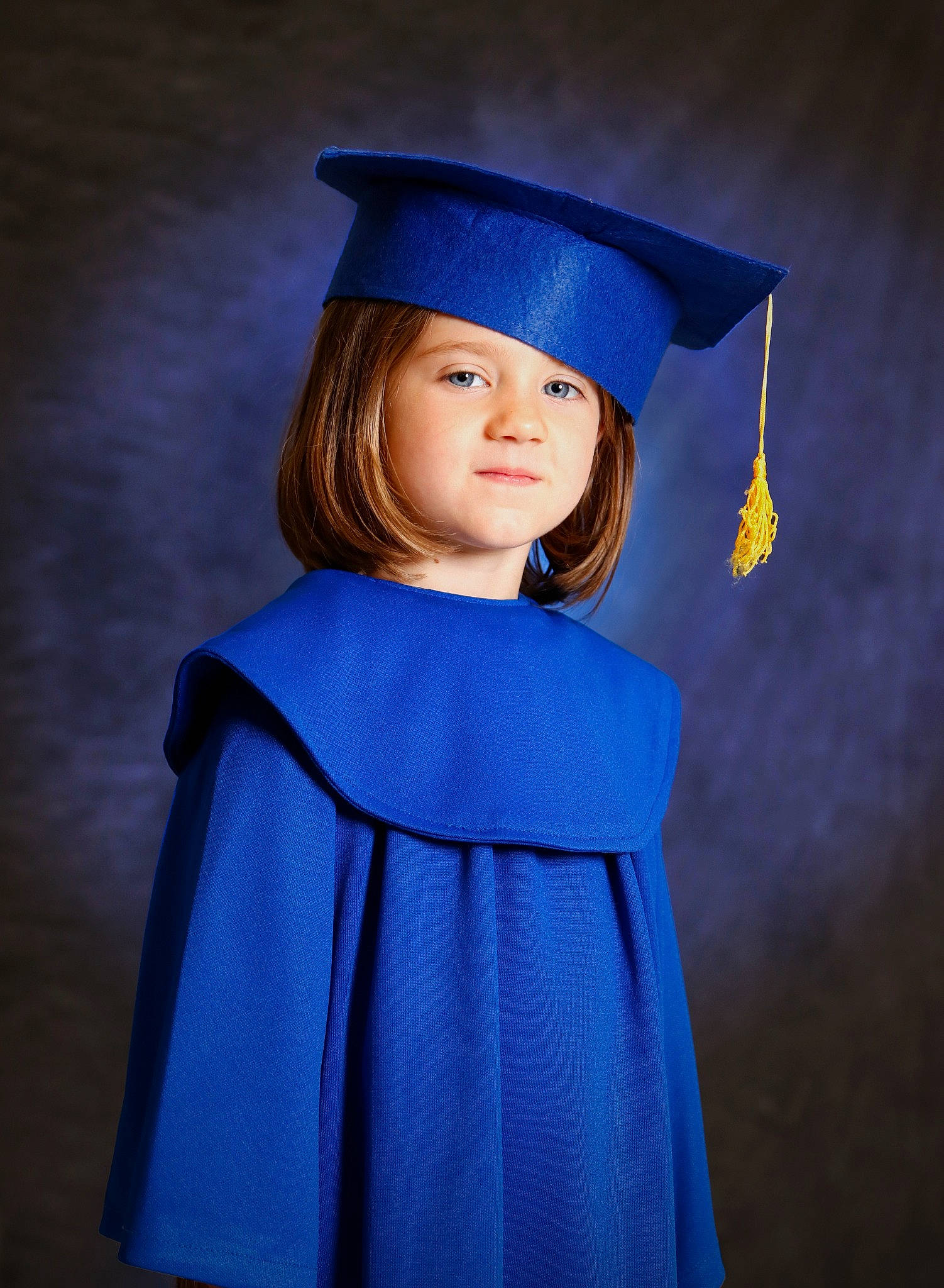 Izzy joined the competition — help win amazing prizes! academic_dress, azure, chin, electric_blue, eye, face, gesture, hair, hairstyle, happy, hat, head, headgear, headwear, mortarboard, neck, one_piece_garment, person, purple, scholar