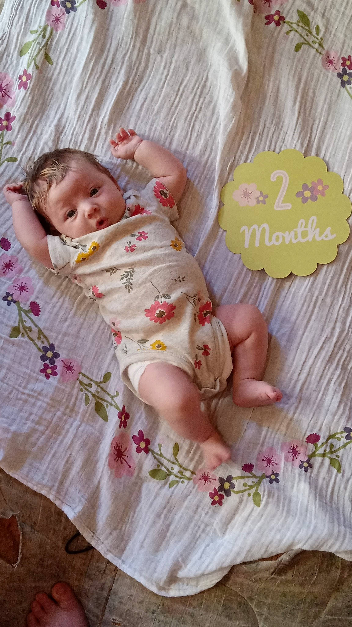 Mckenna is registered to the contest to win money with this photo: baby, baby_products, baby_safety, baby_sleeping, baby_toddler_clothing, bedding, child, comfort, finger, font, happy, linens, magenta, pattern, peach, person, pink, product, sitting, skin