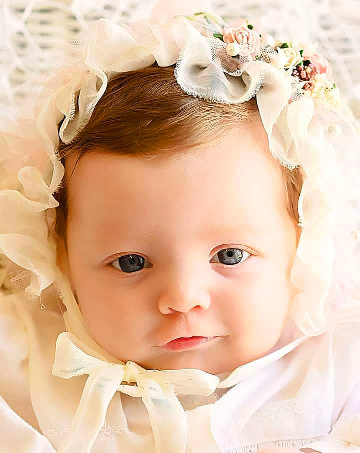 Mckenna joined the competition — help win amazing prizes! chin, dress, eye, eyebrow, eyelash, face, flash_photography, hair, hairstyle, happy, head, headgear, iris, lip, person, petal, picture_frame, pink, skin, textile