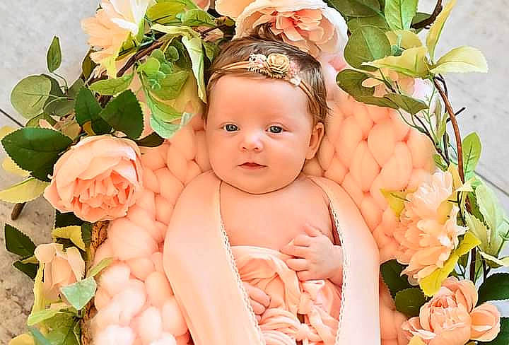 Mckenna joined the competition — help win amazing prizes! baby, baby_toddler_clothing, botany, child, finger, flower, flower_arranging, grass, happy, headgear, headpiece, leaf, people_in_nature, person, petal, pink, plant, rose, rose_family, skin