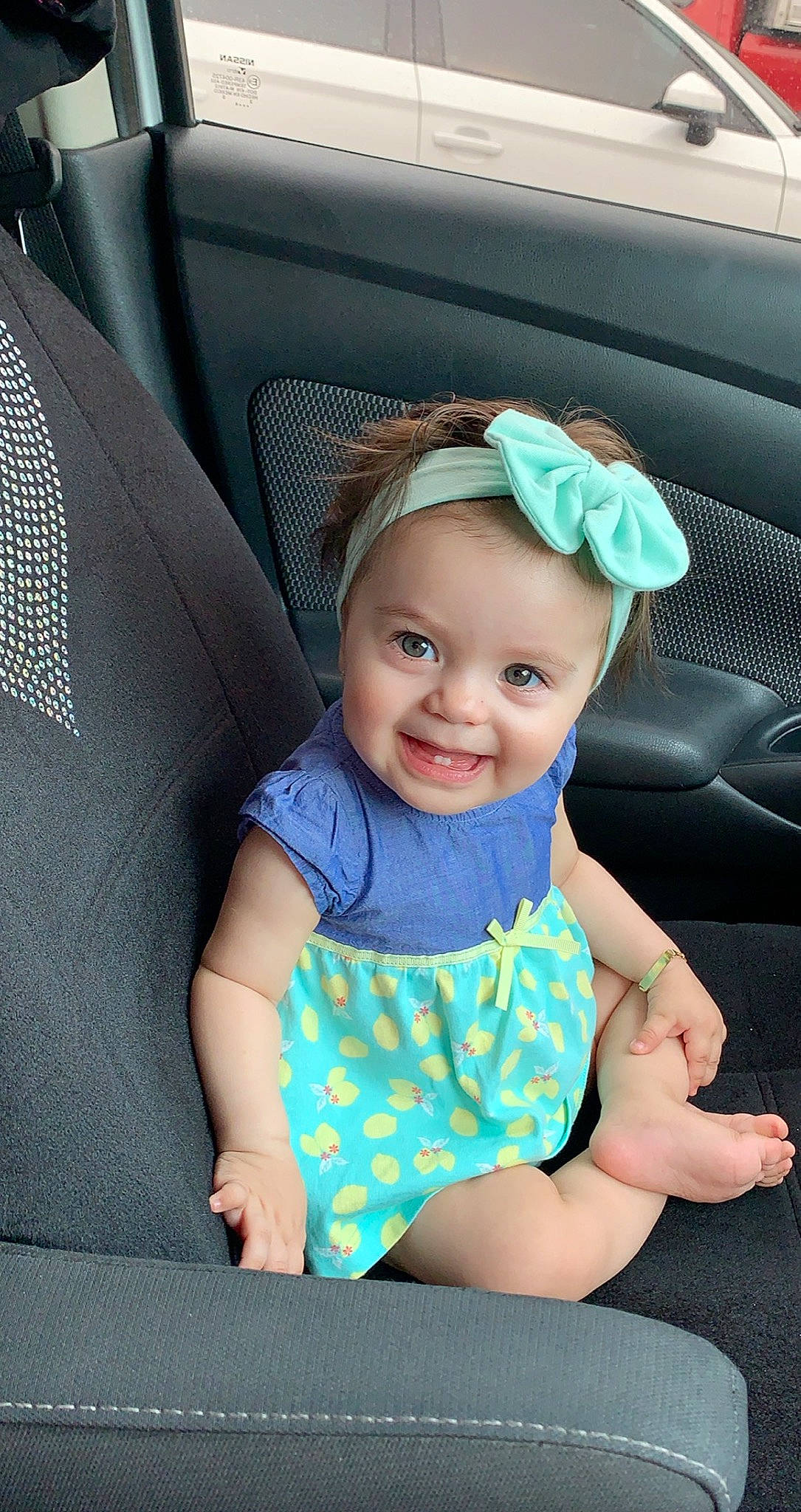 Heather joined the competition — help win amazing prizes! aqua, automotive_design, azure, baby_toddler_clothing, blue, car, comfort, face, flash_photography, hair, happy, head, joy, motor_vehicle, person, photograph, product, smile, thigh, toddler