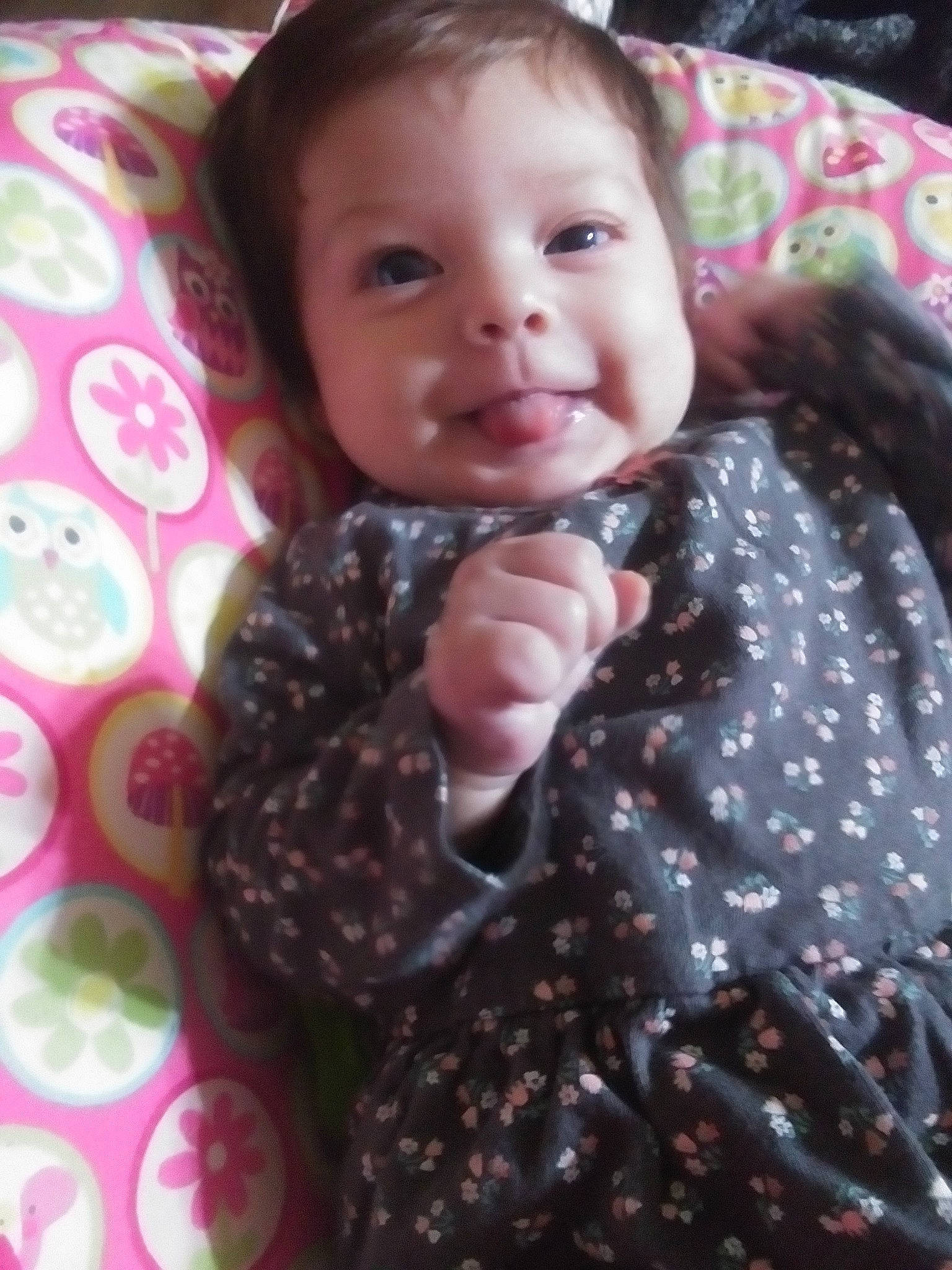 Chasity is registered to the contest to win money with this photo: arm, baby, baby_toddler_clothing, cheek, eye, face, finger, gesture, hairstyle, happy, head, iris, lip, outerwear, person, pink, skin, sleeve, smile, textile