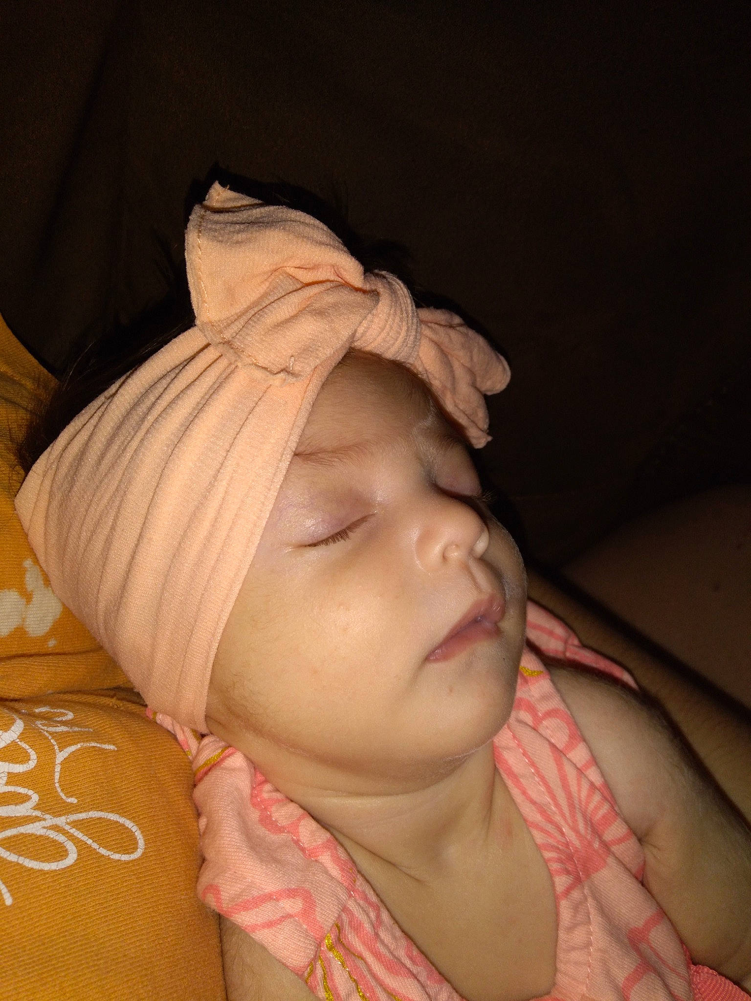 Chasity is registered to the contest to win money with this photo: baby, baby_sleeping, baby_toddler_clothing, cheek, chin, comfort, eyebrow, eyelash, face, finger, head, headwear, human_body, lip, mouth, neck, nose, person, skin, sleeve
