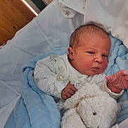 Arley joined the competition — help win amazing prizes! newborn, baby, infant, blanket, stuffed_animal, plush_toy, sleeping_bag, clothing, bed, face, hand, cozy, indoors, cute, soft_texture, child, portrait, resting, comfort, warm