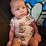 Miracle joined the competition — help win amazing prizes! arms, baby, blanket, blue_blanket, child, couch, curious_expression, head, indoor, infant, legs, mittens, monkey_pattern, onesie, person, pink_clothing, plush_blanket, seated, skin, soft_lighting