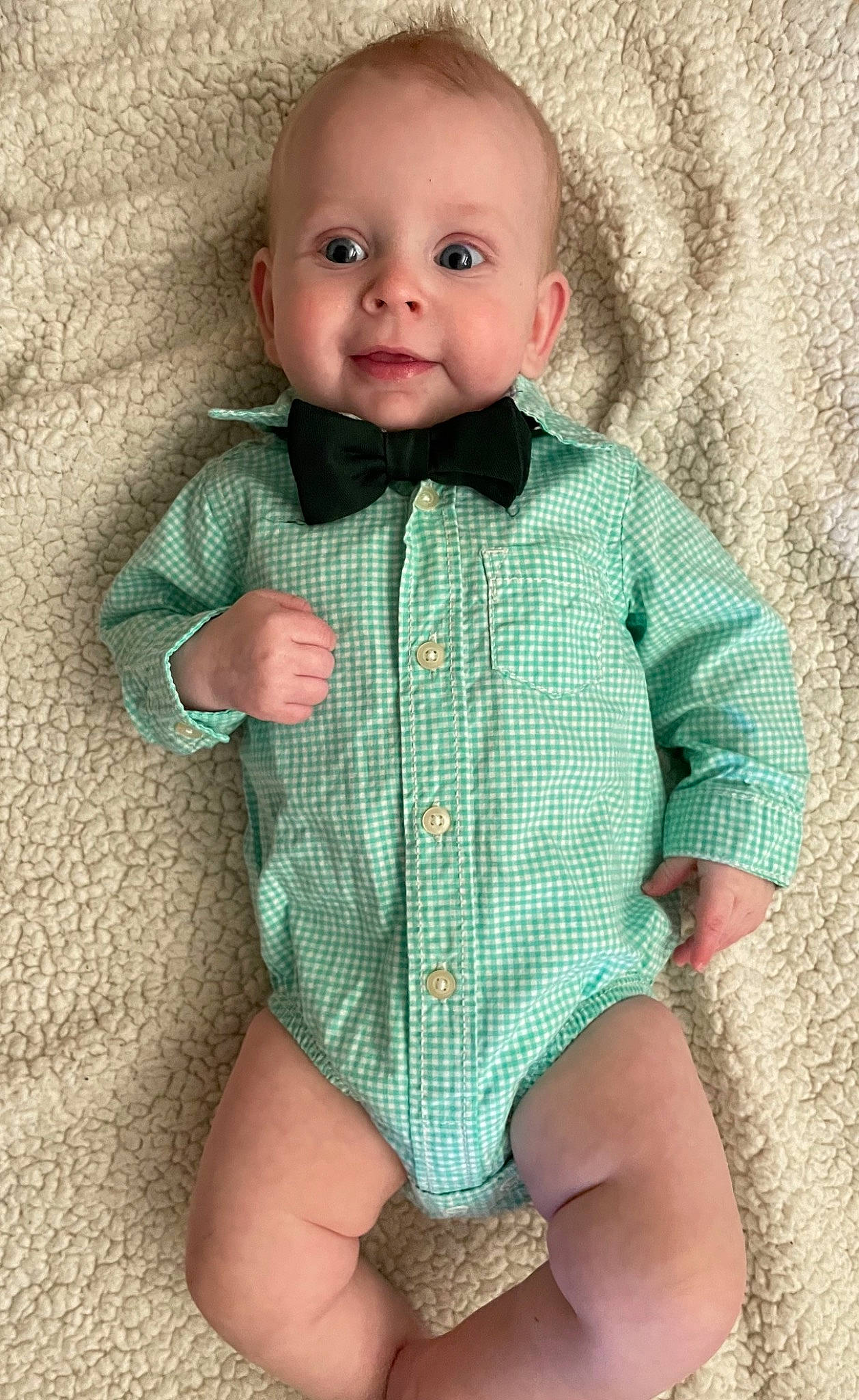 Leo is registered to the contest to win money with this photo: baby, baby_toddler_clothing, cheek, chin, collar, dress_shirt, eye, face, hairstyle, head, human_body, leg, neck, person, pink, skin, sleeve, smile, standing, textile