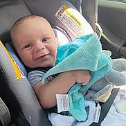 Jameson joined the competition — help win amazing prizes! baby, car_seat, smile, blanket, child, infant, blue_blanket, seatbelt, car_interior, soft_toy, cute, happy, face, young_child, safety, sunlight, portrait, childrens_toy, comfort, clothing