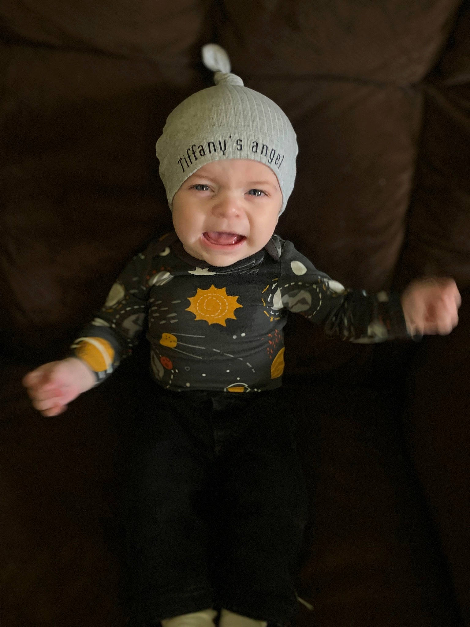 Colton is registered to the contest to win money with this photo: baby, baby_toddler_clothing, beanie, cap, cheek, child, fashion_accessory, flash_photography, flooring, happy, headwear, helmet, human_body, knit_cap, person, personal_protective_equipment, shorts, sleeve, smile, toddler