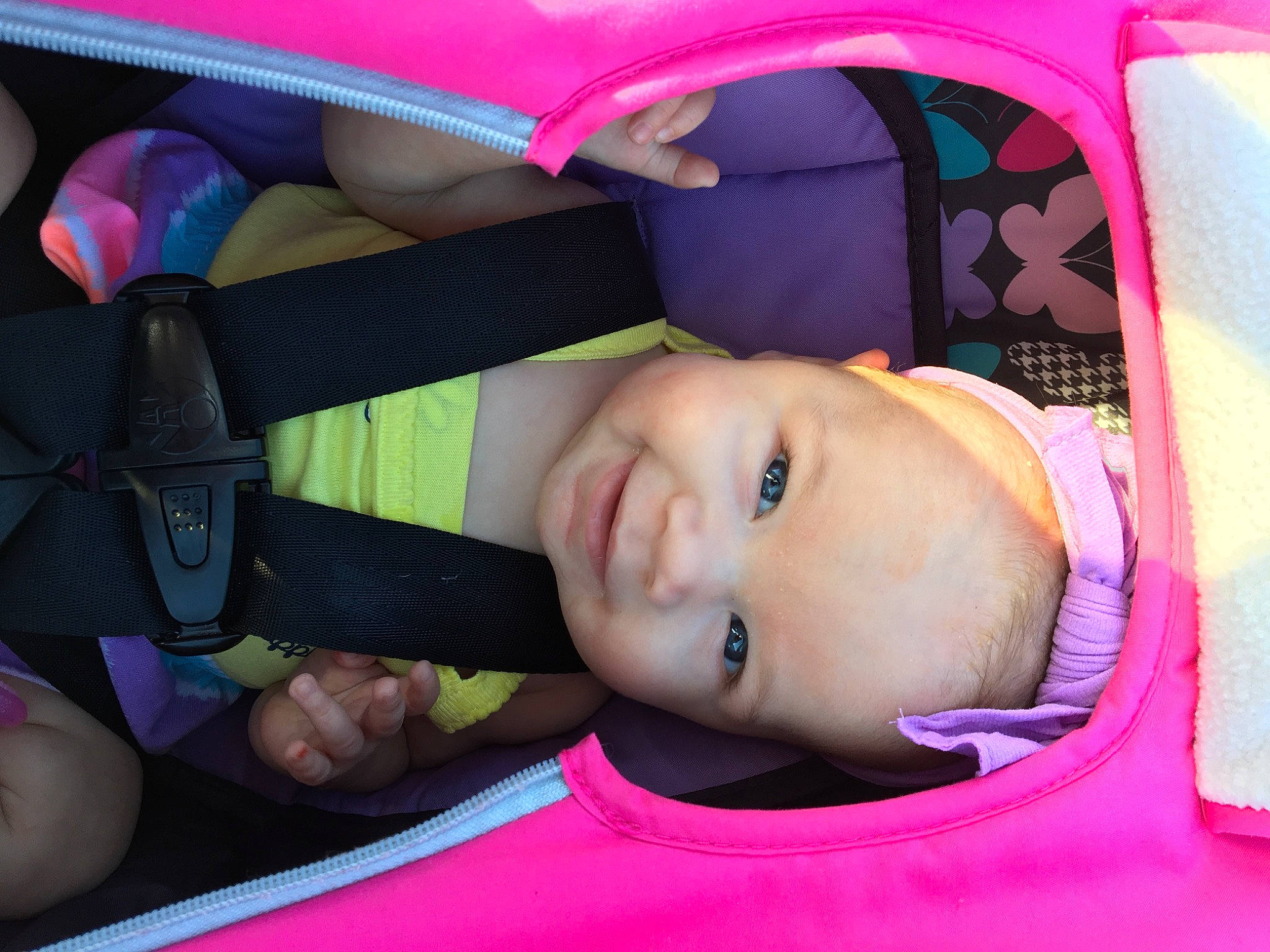 Alyla is registered to the contest to win money with this photo: baby, baby_carriage, baby_in_car_seat, baby_products, beauty, car_seat, cheek, child, cool, eye, face, fun, head, headwear, mouth, nose, person, pink, product, skin