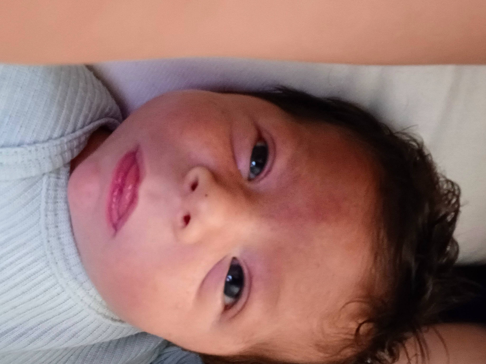 Connor is registered to the contest to win money with this photo: baby, baby_toddler_clothing, cheek, child, close_up, comfort, ear, eyebrow, eyelash, forehead, happy, human_body, iris, jaw, lip, mouth, nose, person, skin, smile