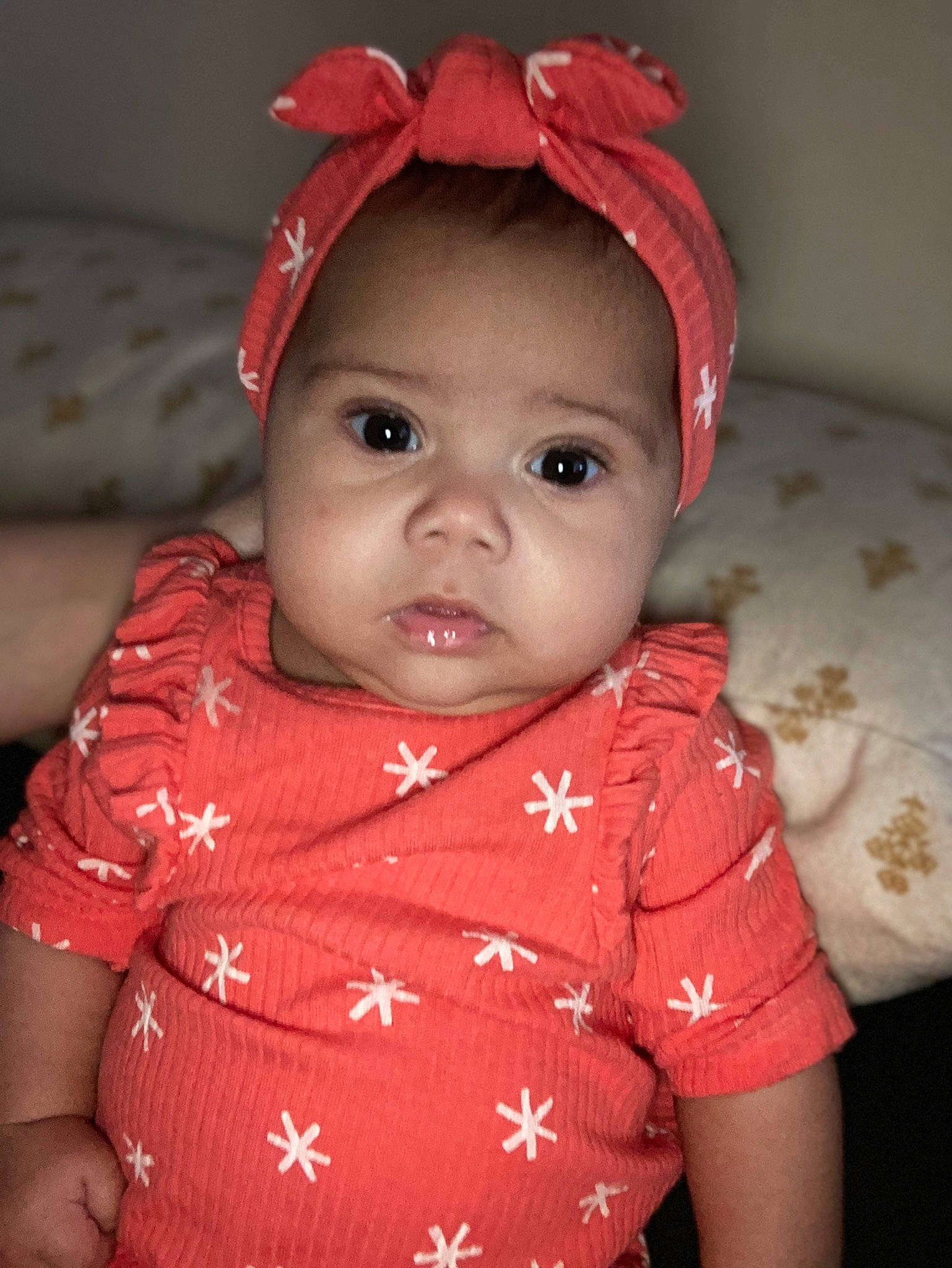 Jewel joined the competition — help win amazing prizes! baby, baby_toddler_clothing, cap, cheek, collar, dress, eye, eyebrow, eyelash, happy, headwear, human_body, iris, lip, mouth, neck, nose, person, pink, skin