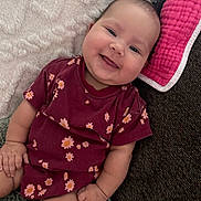 Lilah joined the competition — help win amazing prizes! applique, baby, babylaughing, bodypart, couch, cushion, face, finger, furniture, hand, happy, head, homedecor, newborn, pattern, person, photography, portrait, sitting, smile