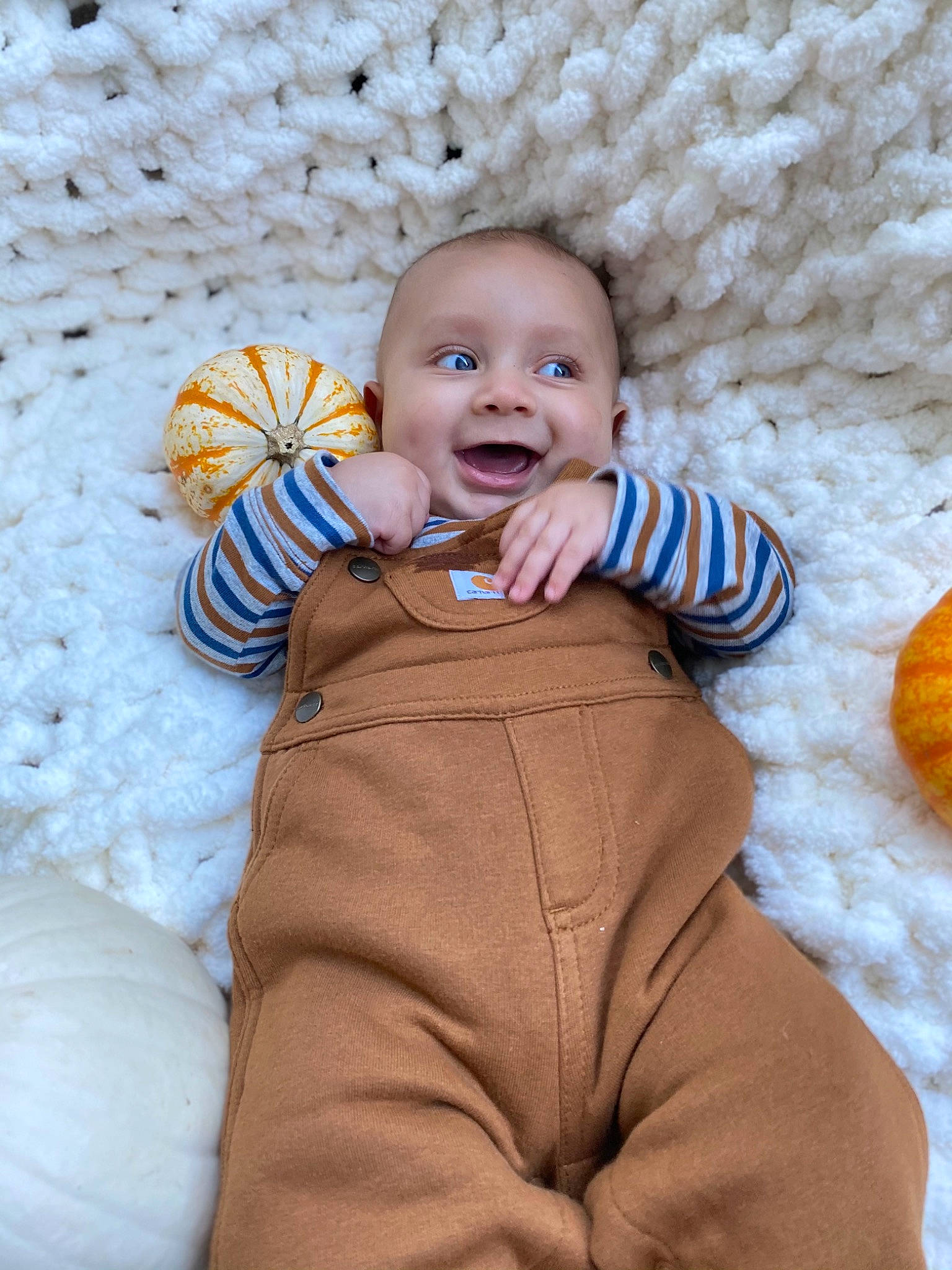 Legend joined the competition — help win amazing prizes! baby, baby_toddler_clothing, child, face, orange, person, pumpkin, sitting, skin, smile, toddler, yellow