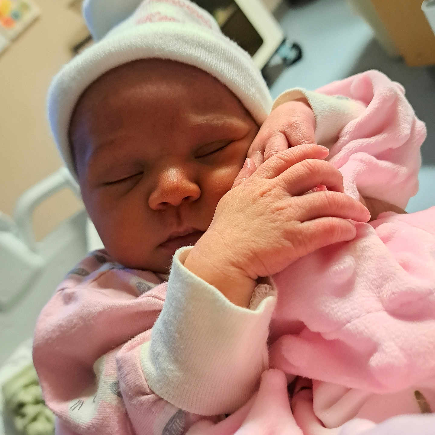 Giulianna is registered to the contest to win money with this photo: baby, newborn, sleeping, infant, pink_blanket, hat, hand, cute, cozy, soft, hospital, closeup, peaceful, child, person, wrapped, warm, face, tiny_hands, indoors