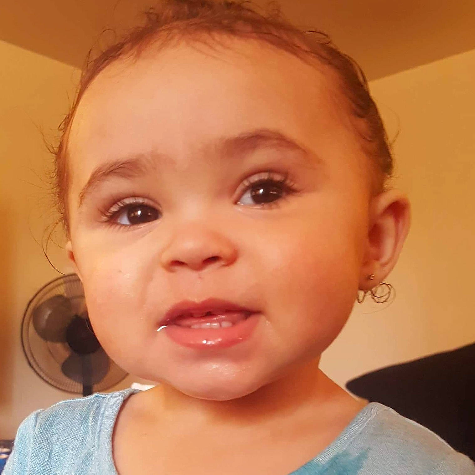 Gabriella is registered to the contest to win money with this photo: baby_making_funny_faces, cheek, child, chin, close_up, ear, eye, eyebrow, face, facial_expression, forehead, hair, head, lip, mouth, nose, organ, person, skin, smile