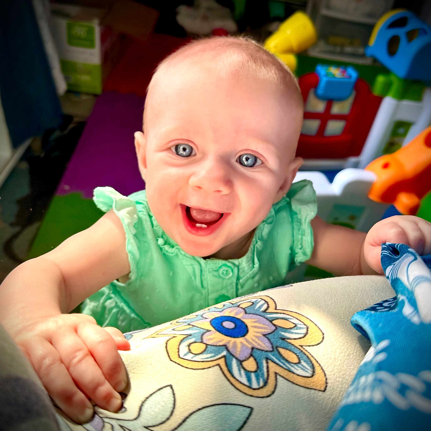 Abby joined the competition — help win amazing prizes! baby, babylaughing, bodypart, clothing, cushion, face, finger, hand, happy, head, homedecor, indoors, laughing, mouth, person, photography, portrait, smile, t_shirt, toy