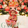 baby, child, smiling, hat, chair, strawberry, red_and_white, gingham, dress, plants, flowers, decorations, studio, portrait, happy, sitting, cute, indoors, photography, background