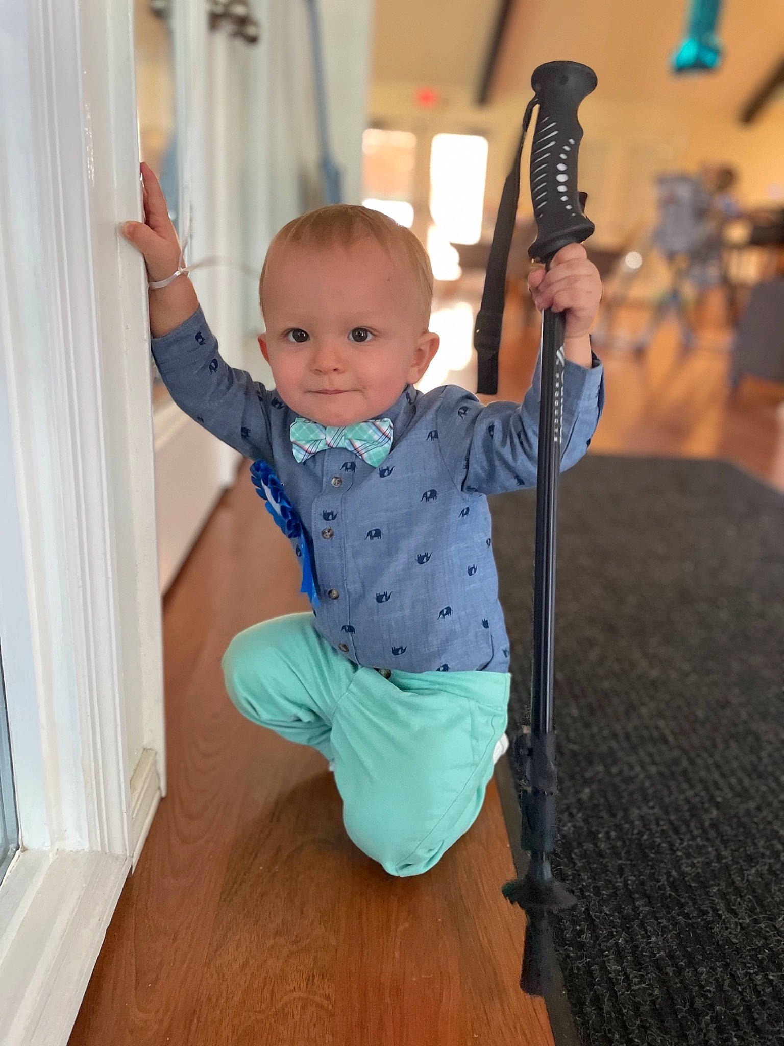 Carter is registered to the contest to win money with this photo: baby, baby_toddler_clothing, barefoot, curtain, elbow, floor, flooring, fun, happy, joint, knee, leg, leisure, person, shoulder, sleeve, smile, t_shirt, toddler, waist