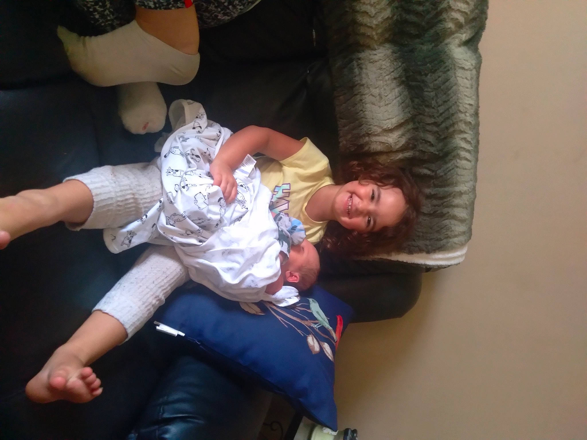 Gracelynn Jane is registered to the contest to win money with this photo: arm, child, comfort, elbow, event, foot, fun, gesture, hairstyle, happy, human_body, human_leg, joint, joy, knee, lap, person, sitting, smile, thigh