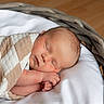 Caissian joined the competition — help win amazing prizes! newborn, baby, sleeping, infant, portrait, basket, blanket, pillow, cozy, indoors, peaceful, resting, curled_up, hands, face, closed_eyes, soft_light, wood_floor, wicker, home