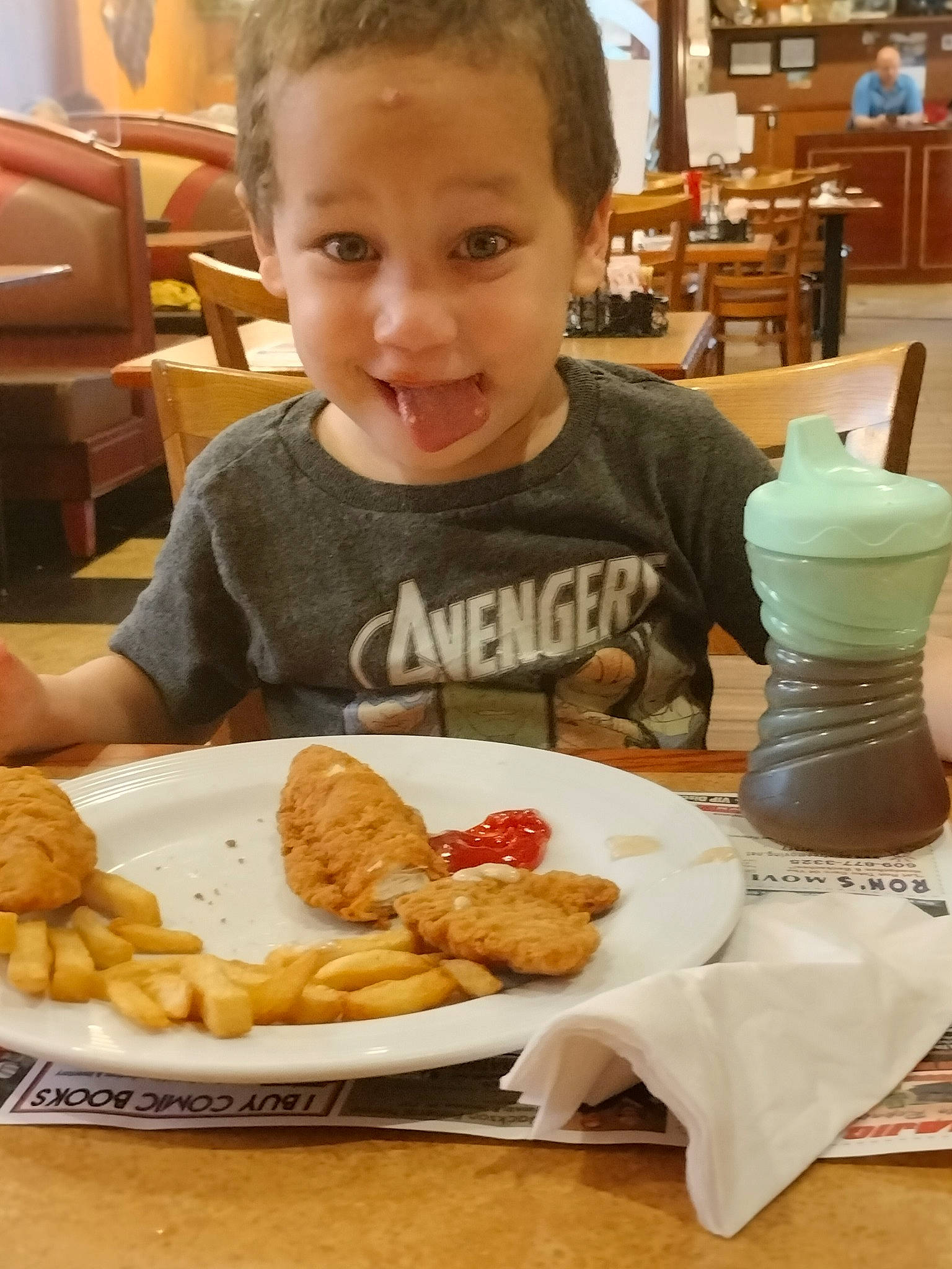 Karl-gerome is registered to the contest to win money with this photo: baked_goods, baking, blurred, chair, comfort_food, cooking, cuisine, dish, fast_food, finger_food, food, food_craving, ingredient, junk_food, person, salt_and_pepper_shakers, sharing, smile, t_shirt, table