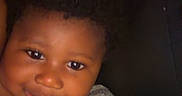 Azari joined the competition — help win amazing prizes! toddler, child, smiling, blanket, face, curly_hair, portrait, happy, closeup, skin, baby, comfort, warmth, expression, indoors, soft_texture, cozy, person, head, cuddle