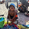 toddler, beach, sand, chair, hat, bucket, toys, towel, sunny, smiling, child, outdoor, summer, vacation, happy, barefoot, baby, play, relax, sunshade