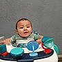 Jonah Gutierrez joined the competition — help win amazing prizes! baby, child, infant, walker, toy, smiling, face, clothing, indoor, seat, play, happy, young, person, cute, expression, childhood, colorful, furniture, background