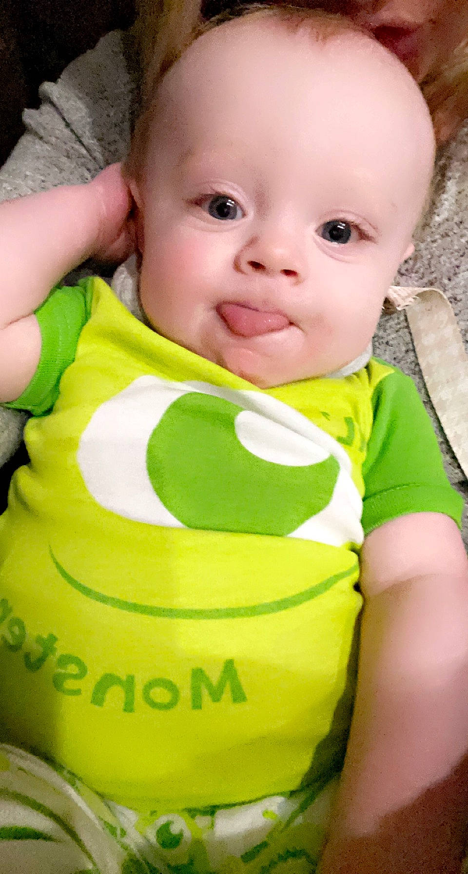 Ledger is registered to the contest to win money with this photo: baby, baby_products, baby_toddler_clothing, cheek, child, collar, fun, grass, happy, iris, pattern, person, photography, portrait_photography, sitting, sleeve, smile, t_shirt, toddler, yellow