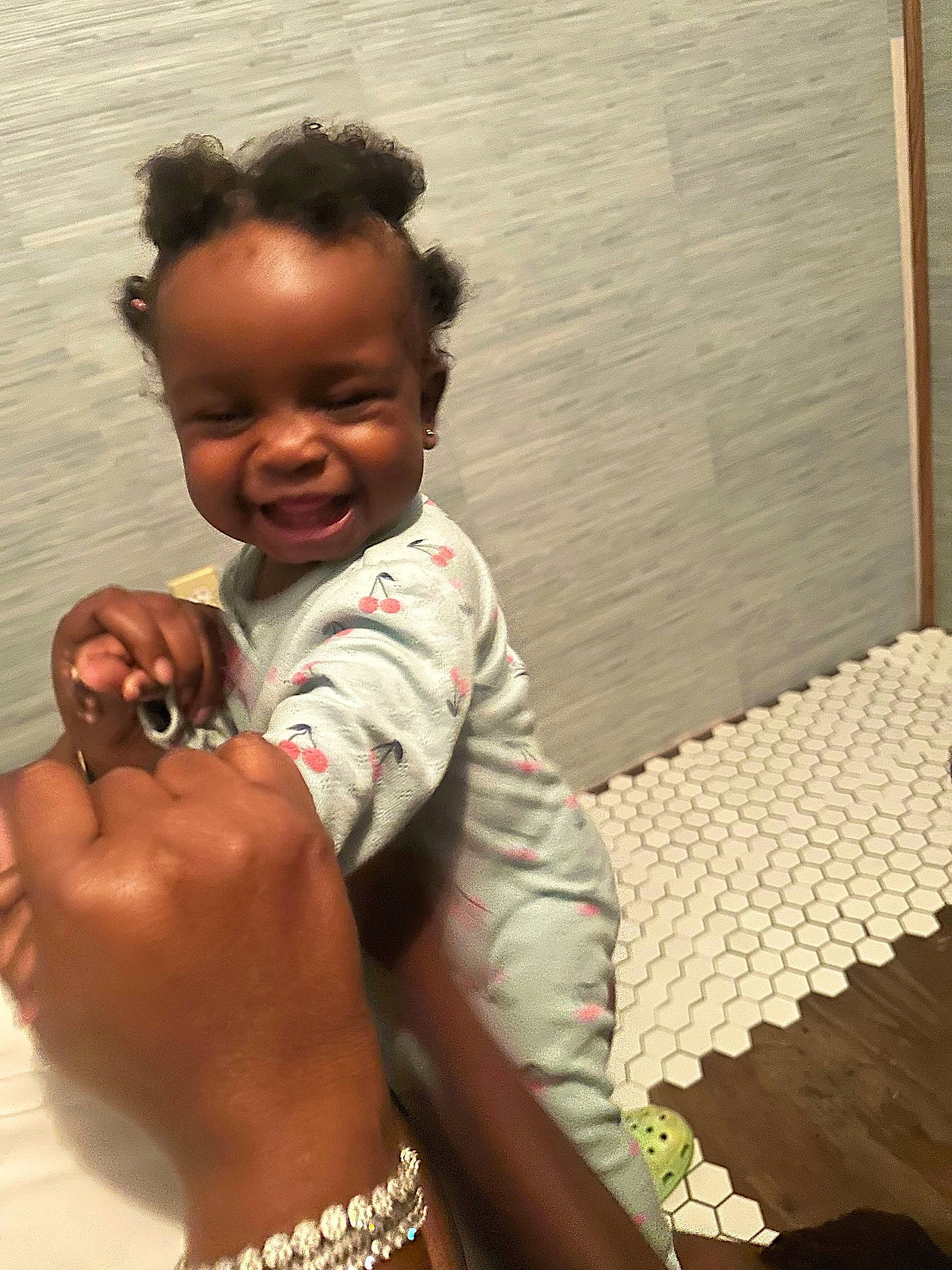 Princess is registered to the contest to win money with this photo: bracelet, chest, child, comfort, elbow, finger, flooring, fun, gesture, hand, happy, jewellery, joy, person, sitting, skin, sleeve, smile, thumb, toddler