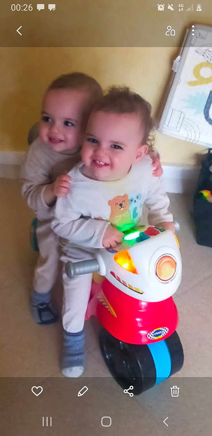 Chems Et Waël participe au concours pour gagner de l'argent avec cette photo : carpet, child, clothing, cute, face, floor, fun, furniture, hands, happy, indoor, light, motorcycle, play, room, sibling, smile, sock, toddler, toy