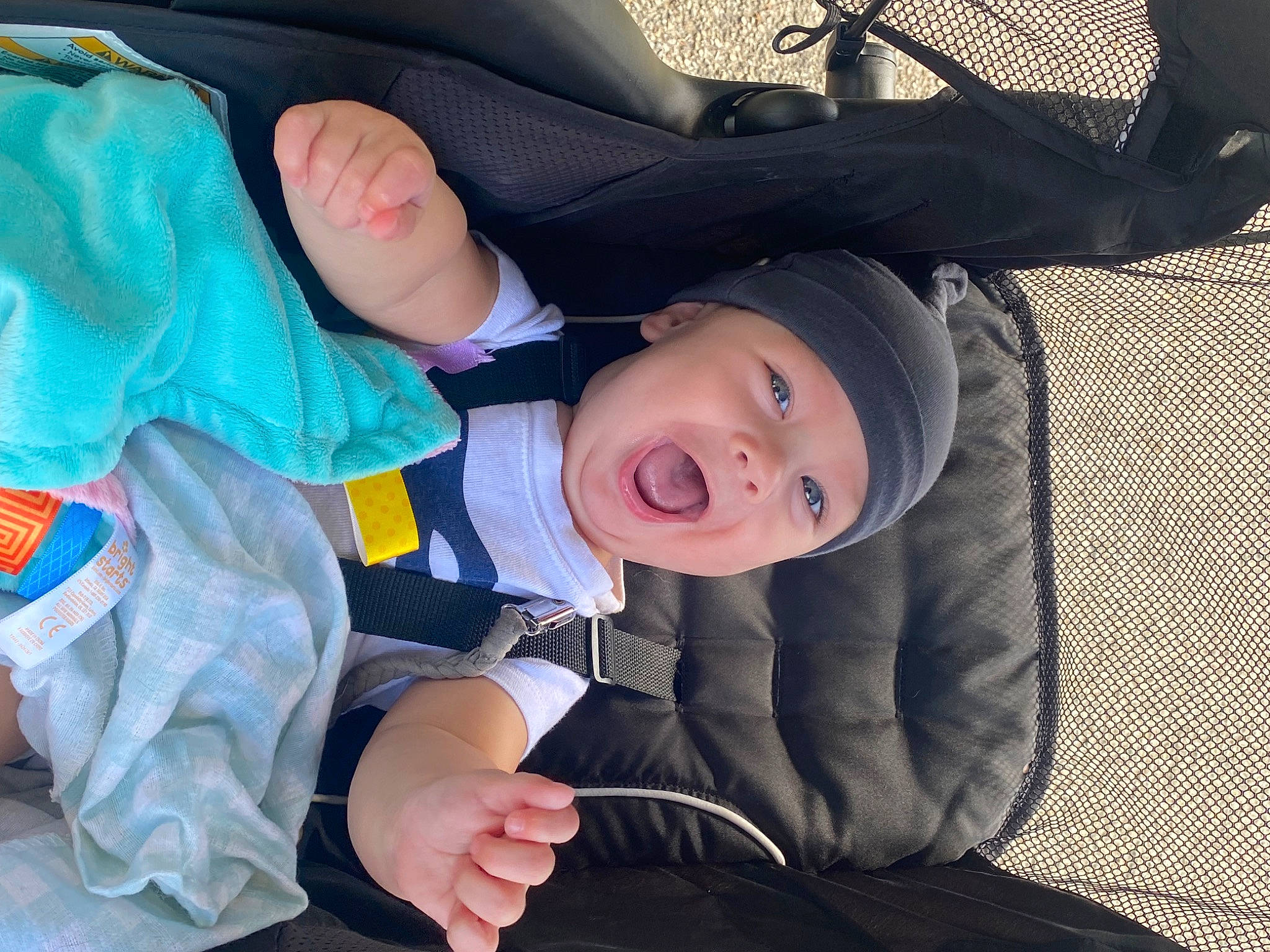 Evryn is registered to the contest to win money with this photo: baby_products, baby_toddler_clothing, child, comfort, electric_blue, fun, gesture, happy, hat, headwear, lap, leisure, luxury_vehicle, person, sitting, sleeve, smile, suit, thumb, toddler