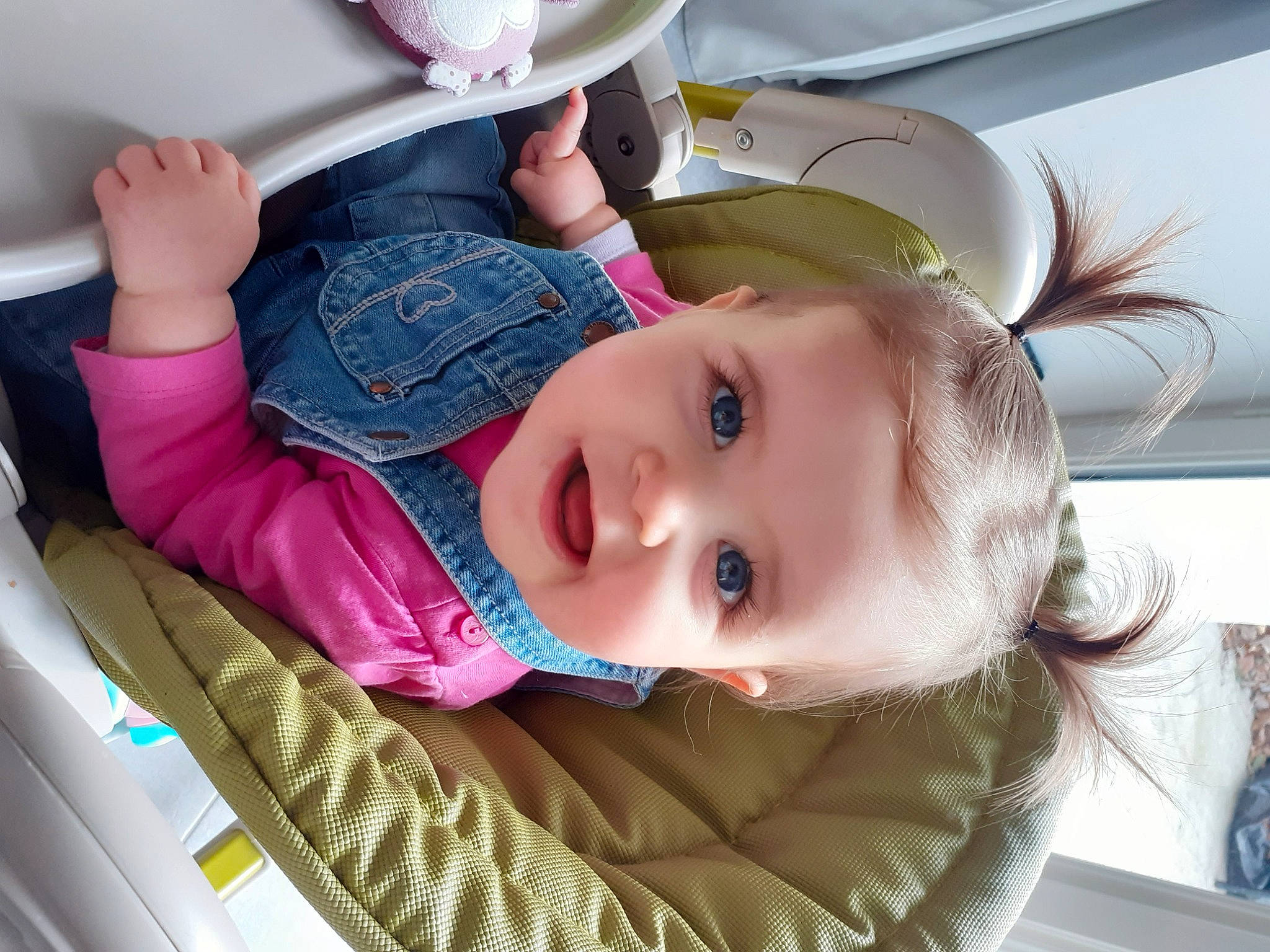 Marley participe au concours pour gagner de l'argent avec cette photo : baby, baby_products, baby_toddler_clothing, cheek, child, comfort, electric_blue, eyelash, fun, happy, mouth, person, room, sitting, skin, smile, toddler, vacation
