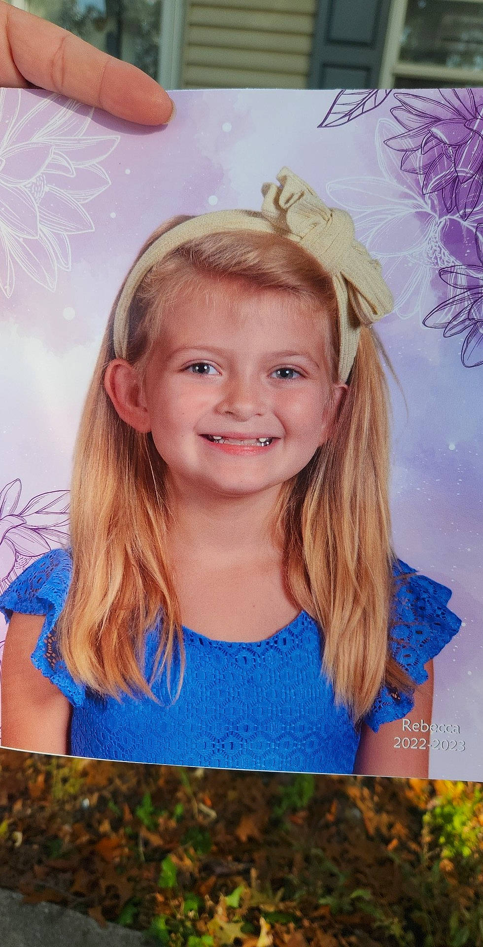 Rebecca is registered to the contest to win money with this photo: beauty, blond, brown_hair, child, electric_blue, event, facial_expression, fun, grass, happy, headpiece, iris, joy, party_supply, people, people_in_nature, person, photograph, pink, smile