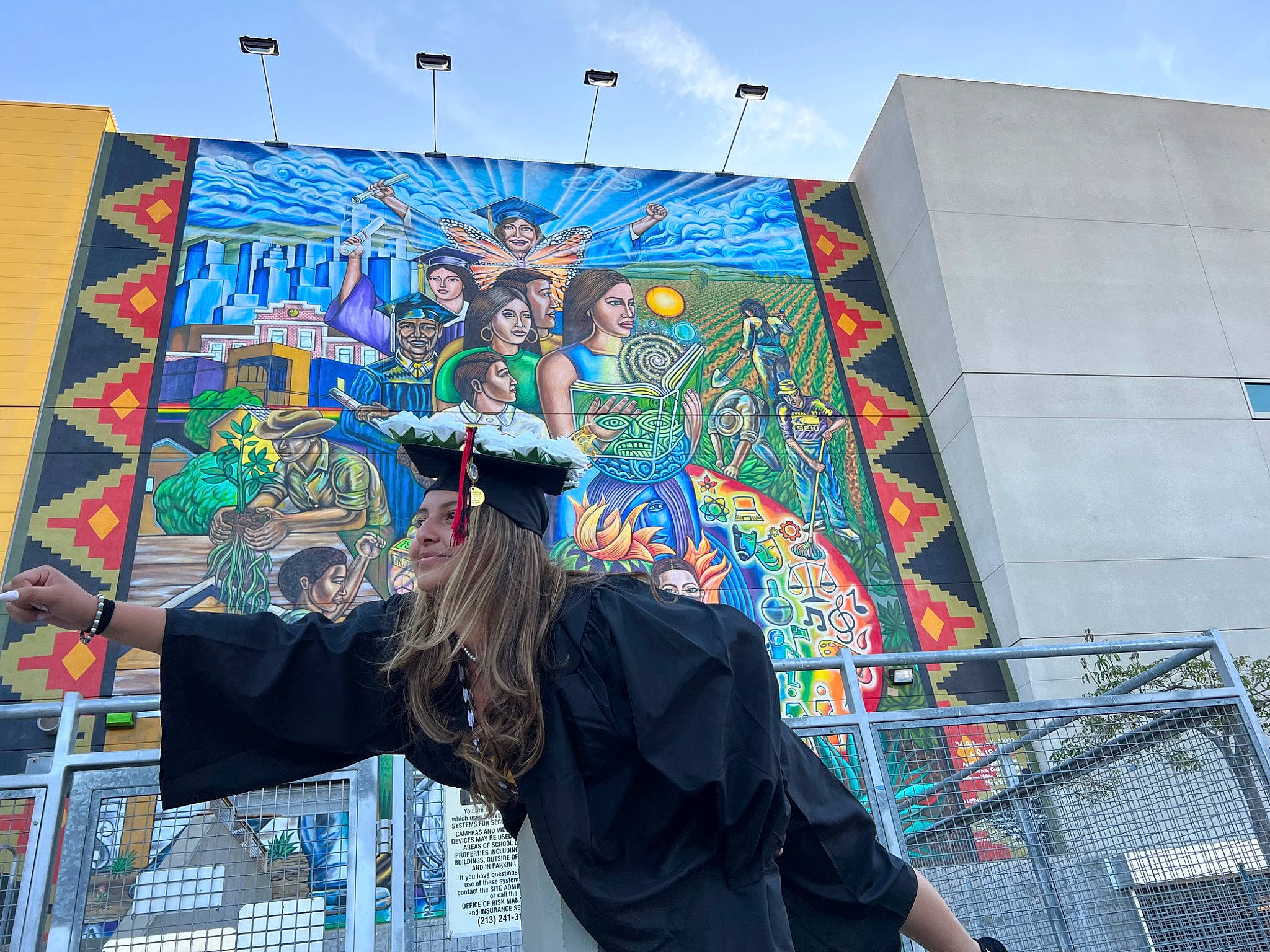 Cecilia is registered to the contest to win money with this photo: advertising, art, artist, banner, city, drawing, event, facade, fun, graffiti, graphics, illustration, leisure, mural, painting, person, road, sky, street, street_artist