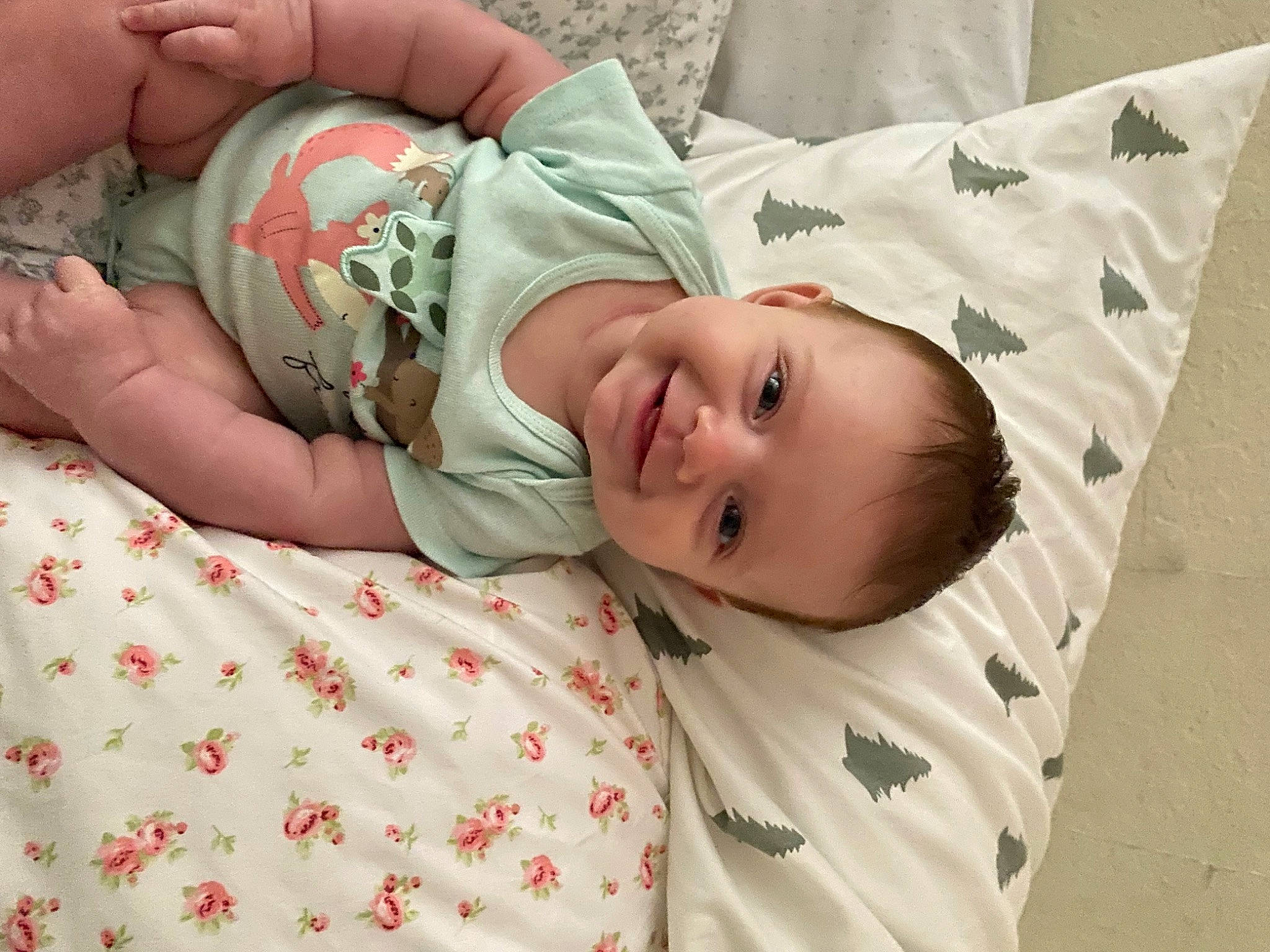 Londyn is registered to the contest to win money with this photo: baby, baby_laughing, baby_products, baby_toddler_clothing, bedding, child, comfort, grass, happy, hat, human_body, joy, linens, pattern, person, skin, sleeve, smile, textile, toddler