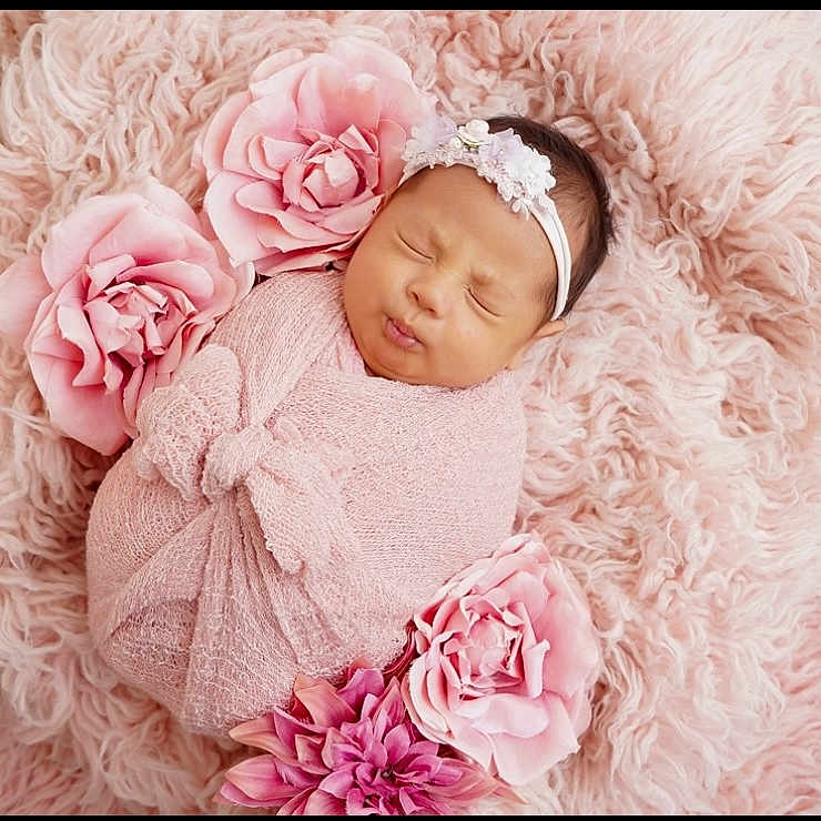 Solymar is registered to the contest to win money with this photo: adorable, baby, blanket, child, cozy, cute, face, flower, fluffy, headband, infant, newborn, peaceful, pink, portrait, resting, sleeping, soft_texture, toddler, wrapped