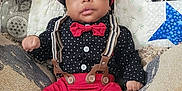 Michael joined the competition — help win amazing prizes! baby, bow_tie, child, closeup, comfortable, cozy, cushions, cute, fashion, indoor, infant, person, polka_dot_shirt, portrait, quilt, red_cap, red_pants, smiling, sneakers, suspenders