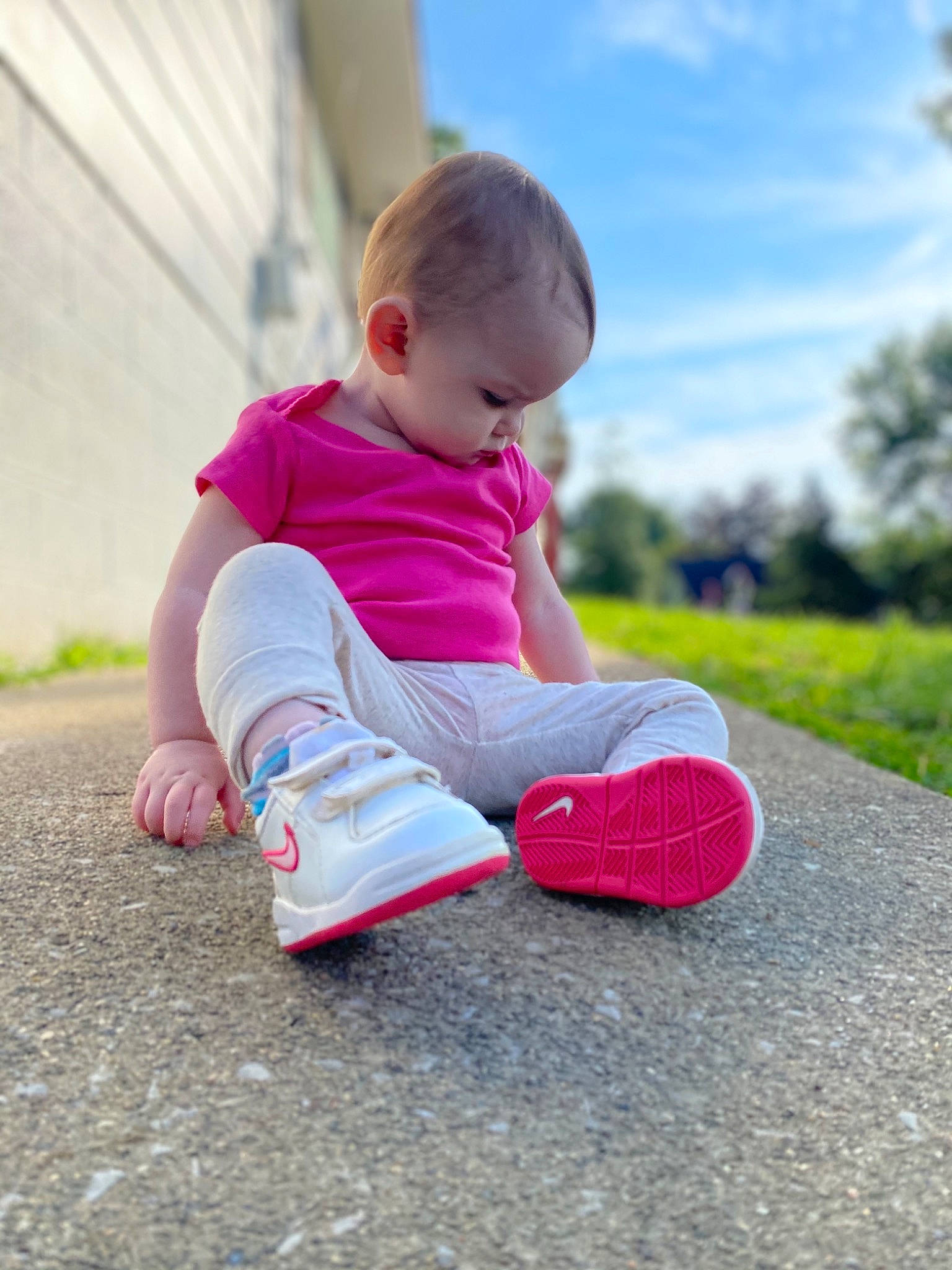 Finnlee joined the competition — help win amazing prizes! baby_toddler_clothing, cloud, flooring, footwear, grass, happy, jeans, knee, leg, leisure, people_in_nature, person, pink, plant, public_space, sky, sneakers, sock, t_shirt, thigh