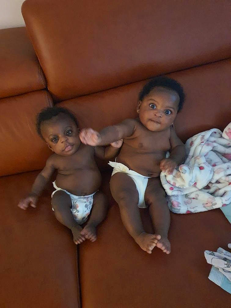 Sevyn is registered to the contest to win money with this photo: baby, cheek, child, leg, person, sitting, skin, smile, toddler