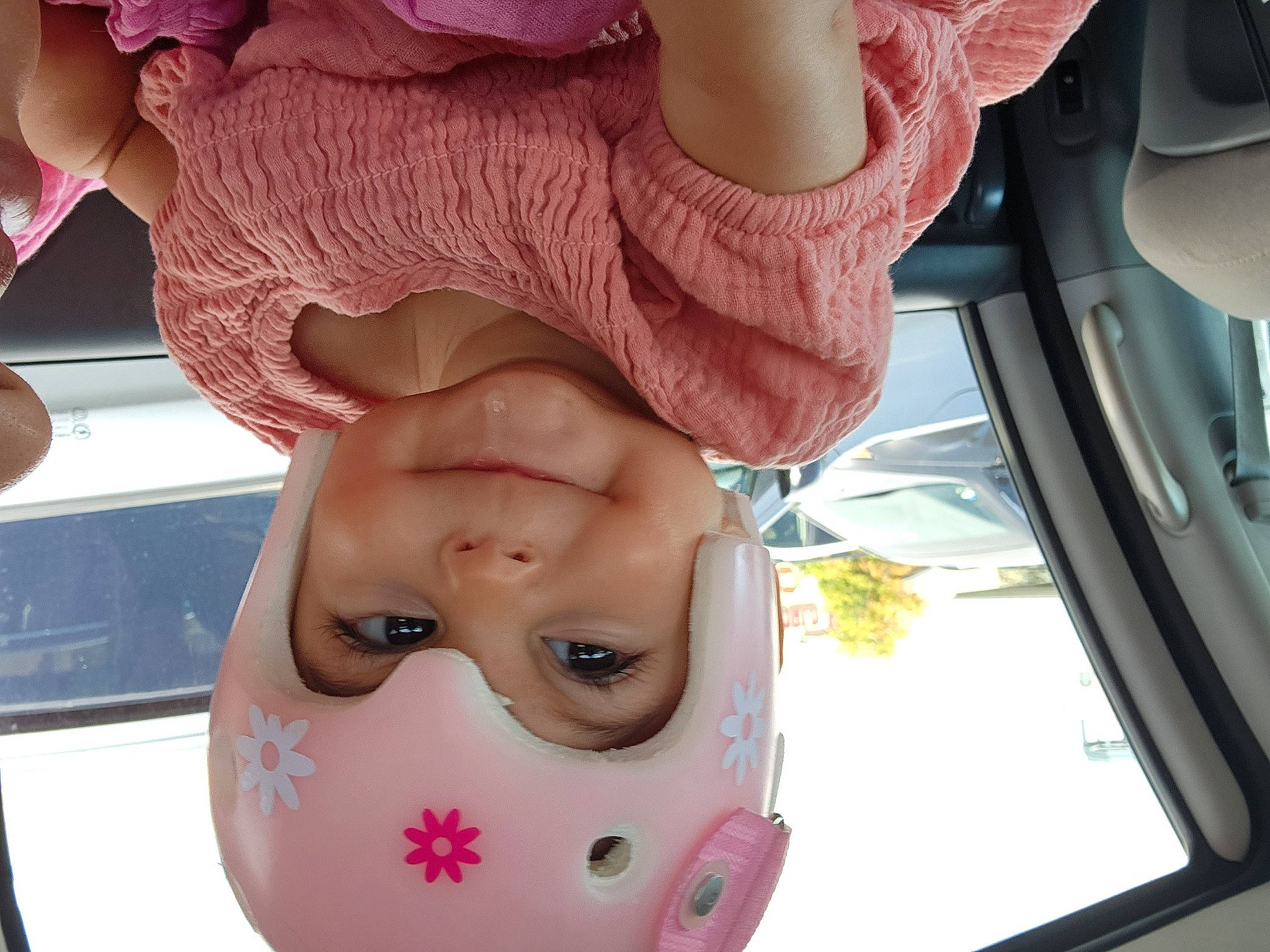 Evalina joined the competition — help win amazing prizes! car_seat, eyelash, family_car, fashion_accessory, finger, flesh, gesture, hand, headwear, human_leg, magenta, nail, nose, peach, person, pink, sunglasses, thumb, toddler, vehicle_door