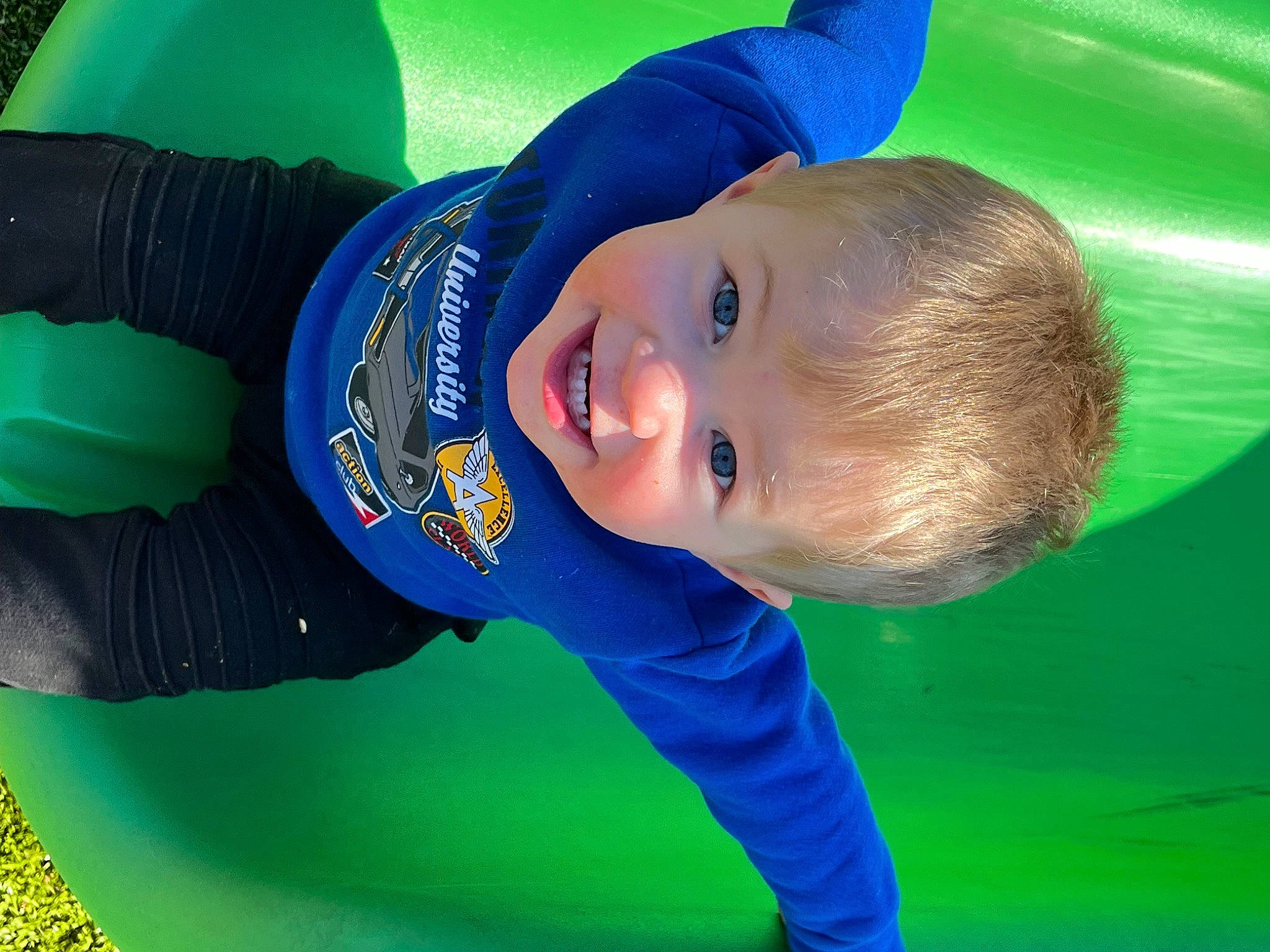 Tucker joined the competition — help win amazing prizes! baby, child, electric_blue, flash_photography, fun, grass, happy, laugh, leisure, outdoor_play_equipment, people_in_nature, person, personal_protective_equipment, play, portrait_photography, recreation, sky, smile, toddler, tree