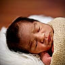 Ezra joined the competition — help win amazing prizes! baby, blanket, closed_eyes, cozy, face, fluffy, head, infant, knit, newborn, peaceful, portrait, resting, skin, sleeping, soft, texture, white, wrapped, young