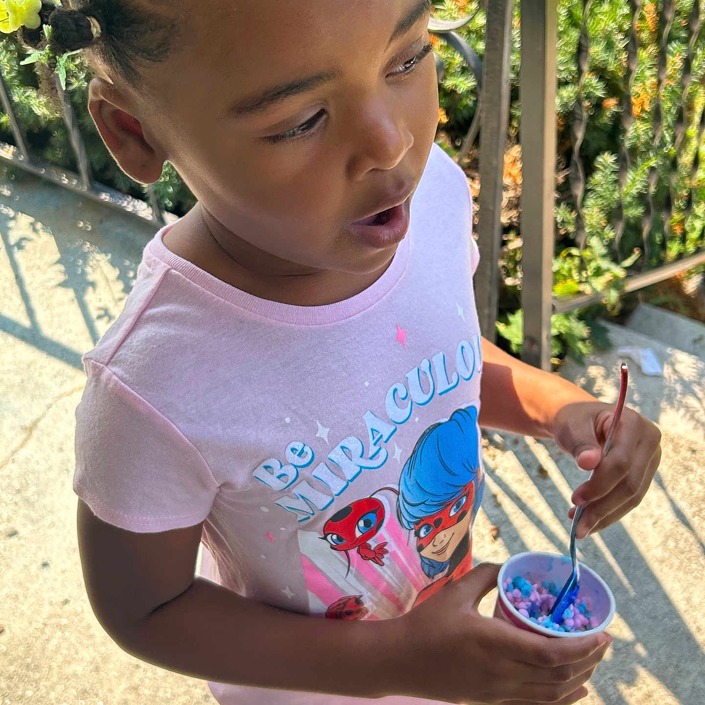 Maria is registered to the contest to win money with this photo: bowl, child, clothing, cream, cutlery, dessert, face, female, food, footwear, frozenyogurt, girl, head, icecream, person, photography, portrait, shoe, spoon, t_shirt